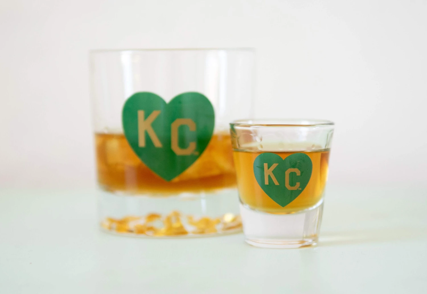 Made In KC X Charlie Hustle KC Heart Shot Glass: Green/Gold 2 Made In KC X Charlie Hustle KC Heart Shot Glass: Green/Gold - Image 2